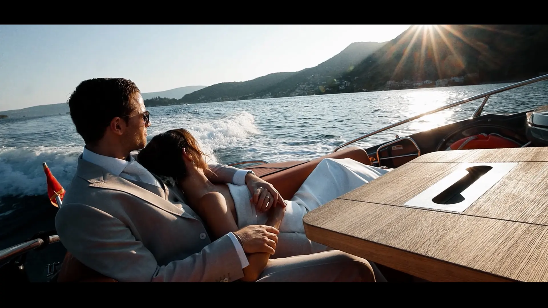 A couple on a wooden boat